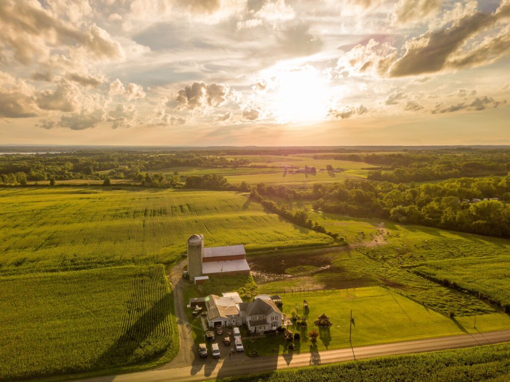 Bird's eye view of a picturesque farm obtained due to an understanding of farm loan requirements